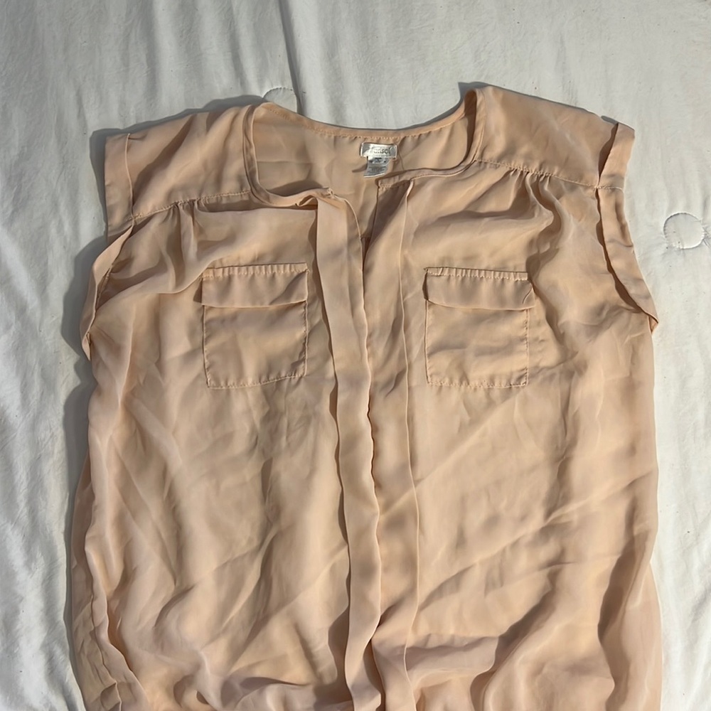 Baby pink blouse.